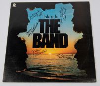 The Band signed LP record album; Island. Signed to front of cover by Robbie Robertson, Rick Danko,