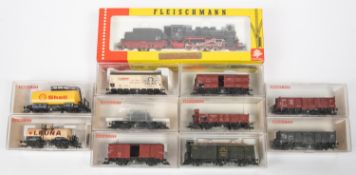Fleischmann HO DB tender locomotive. A Class 55 0-8-0, RN55 2781 in black and red livery. Plus 10