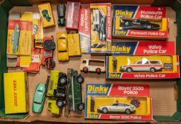 12x Dinky Toys. Boxed examples include; Volvo Police Car (243). Rover 3500 Police car (264).