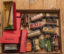 18x Hornby O gauge items. Including 2x 0-4-0 clockwork locomotives; an LMS 0-4-0T loco in lined