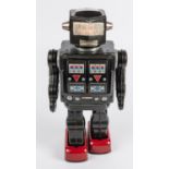 Horikawa Super Astronaut battery powered tinplate Robot. 29cm high, finished in dark metallic grey