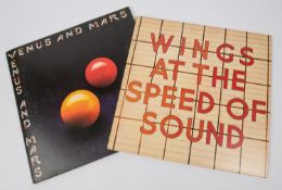 2x Wings (Paul and Linda McCartney) signed LP record album; At the Speed of Sound. Indistinctly