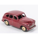 A scarce Dinky Toys Standard Vanguard (40e). An example in maroon with open rear wheel arches,