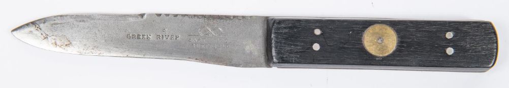 A Green River knife, blade 4½" with scalloped back edge, marked "Green River" and "Cast Steel,