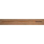 The iron head of a cavalry lance, mounted on a plain wooden haft, 75" overall. GC (the head