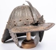 A heavy European "lobster tail" helmet, in the style of c1640