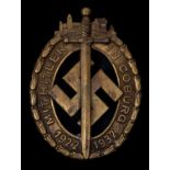 A Third Reich stamped brass badge "Mit Hitler in Coburg 1922-1932". GC £150-200