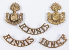 A near matching pair of pre 1900 OR's brass shoulder titles of the Royal Inniskilling Fusiliers,