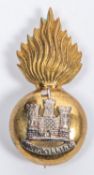 An officer's gilt and silver pugaree grenade of the Inniskilling Fusiliers, with vertical pin