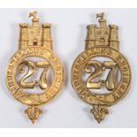 A pre 1881 brass glengarry badge of the 27th Inniskilling Regiment, GC; and a similar reproduction