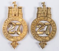 A pre 1881 brass glengarry badge of the 27th Inniskilling Regiment, GC; and a similar reproduction