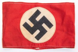 A Third Reich Party armband, red cloth with applied swastika on white circle logo. GC £65-70