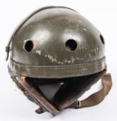 A post WWII US Army tank crew helmet, original olive drab paint, GC (sponge ear piece liners