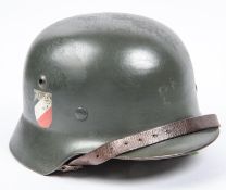 A Third Reich M1935 steel helmet, original paint finish, GC (left hand decal worn, slight wear to