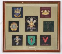 A beautifully presented retirement award being 8 fine quality bullion embroidered unit crests
