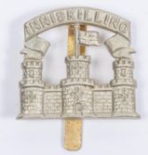A scarce white metal cap badge of the Inniskilling Fusiliers, c 1926-1934. GC £30-50