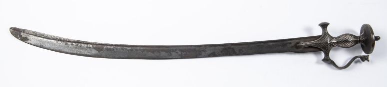 An 18th/19th century Indian tulwar, blade 28½", the iron hilt silver damascened overall, the
