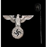 A scarce Third Reich SS cap eagle, and an enamelled SS tie pin. GC £60-80