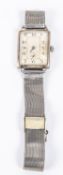 A Rolex silver cased wristwatch on a Fischer metal strap, stamped DRGM to clasp. Back of case