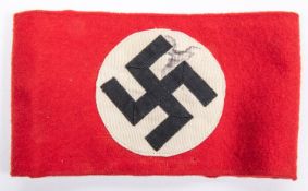 A Third Reich NSDAP arm band with applied swastika motif. GC £150-200