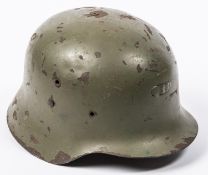 A WWII vintage Spanish Army steel helmet, leather lining, olive drab finish. GC (some chips to