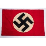 A good Third Reich party flag, 42" x 29", of red material with applied swastika motif. VGC £80-100