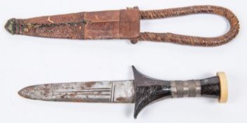 A Nubian arm dagger, blade 5½" with three narrow fullers, dark wood hilt with turned pommel and