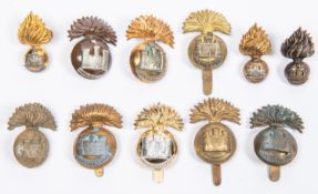 Eight OR's cap badges of the Royal Inniskilling Fusiliers: flag left with lugs, another with khaki