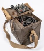 A WWII British Army Electric Morse signalling lamp, in its steel and webbing case complete with 4