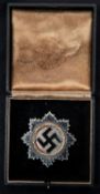 A Third Reich German Cross award with gilt wreath, in its fitted case of issue. GC £65-70