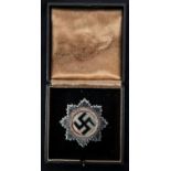 A Third Reich German Cross award with gilt wreath, in its fitted case of issue. GC £65-70