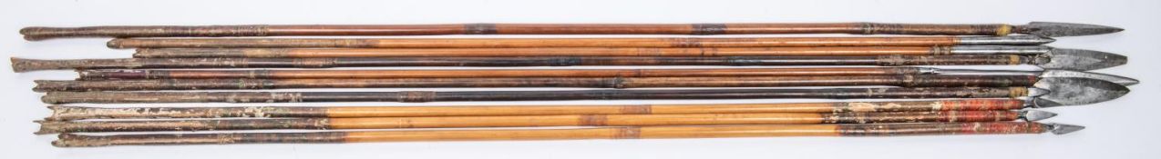 Ten 18th century Indian arrows, including a set of three with small triangular section heads and