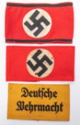 3 Third Reich armbands, 2 party arm bands with applied swastika panels, a yellow "Deutsche