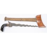 A Malay kris, wavy pamir blade 11½", horn garuda hilt with brass cup ferrule, in its sheath the