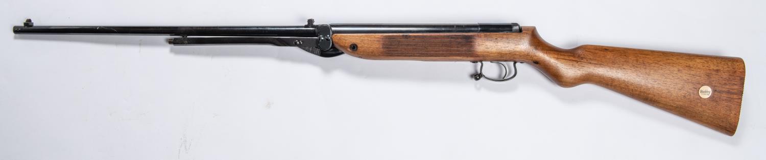 A .22" Webley Mark III series II underlever air rifle, number 4865, the walnut stock having ribbed