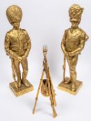 A pair of well executed brass figures of Grenadier Guardsmen, 1815 and 1889, height 17½, signed G