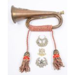 A copper bugle, mounted with a cast brass badge of the Argyll & Sutherland Highlanders, with
