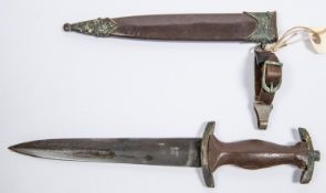A Third Reich SA Man's dagger, in its original scabbard. GC (handle distressed, mounts corroded). £
