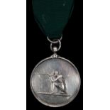 A Rifle Volunteer medal, obverse kneeling rifleman, no legend, designers name W J Taylor London