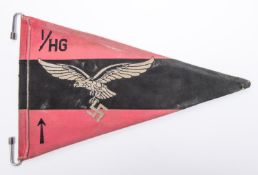 A Third Reich Luftwaffe vehicle pennant, 13" x 9", black and crimson with embroidered eagle and