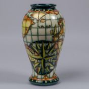 A Moorcroft pottery tall vase. With world map, nautical designs, fantasy creatures, etc. Impressed