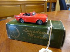 A Lansdowne Models white-metal 1:43 scale 1963 Sunbeam Alpine Series III Soft-Top (LDM 11). In red