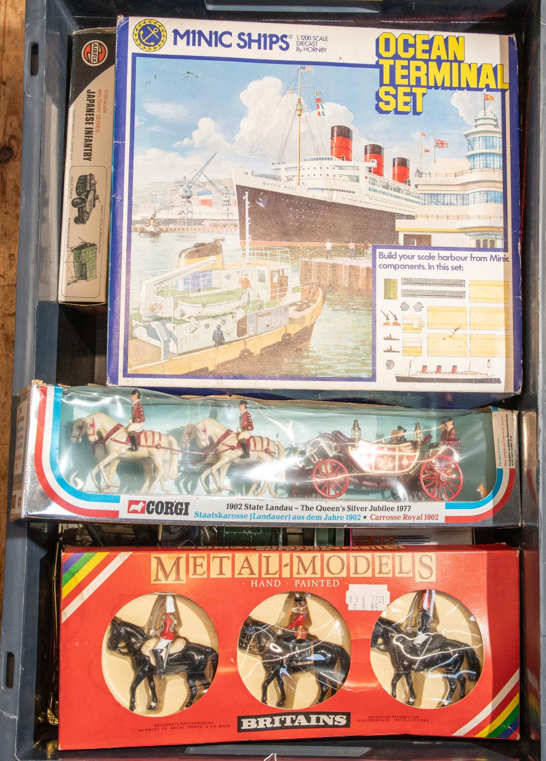 A quantity of various makes. A Minic Ships Ocean Terminal set including RMS Queen Mary, 2 tugs,