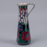 A Moorcroft pottery jug from 1995. A trial piece in the style of Charles Rennie Mackintosh.