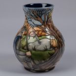 A Moorcroft pottery vase. Arthurian scene showing Sir Bedivere throwing the sword Excalibur into the
