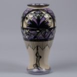 A Moorcroft pottery tall vase. With Art Nouveau design. Impressed marks etc to base, dated 1993