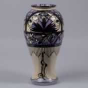 A Moorcroft pottery tall vase. With Art Nouveau design. Impressed marks etc to base, dated 1993