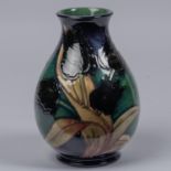 Moorcroft pottery vase from 1991. 'Black Tulip' design by Sally Tuffin. Impressed marks etc to