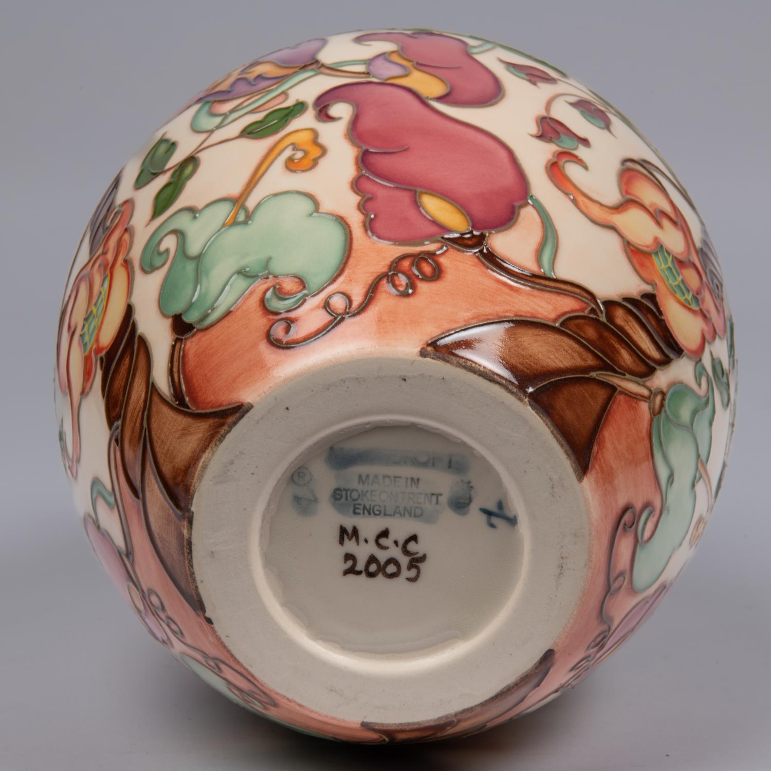A Moorcroft pottery vase. With a stylised mixed floral design. Marks to base, pineapple date - Image 4 of 4