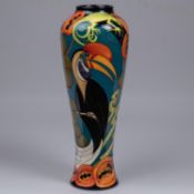 A Moorcroft pottery vase. Hornbills with lizards and pomegranates by Kerry Goodwin. Marks to base,